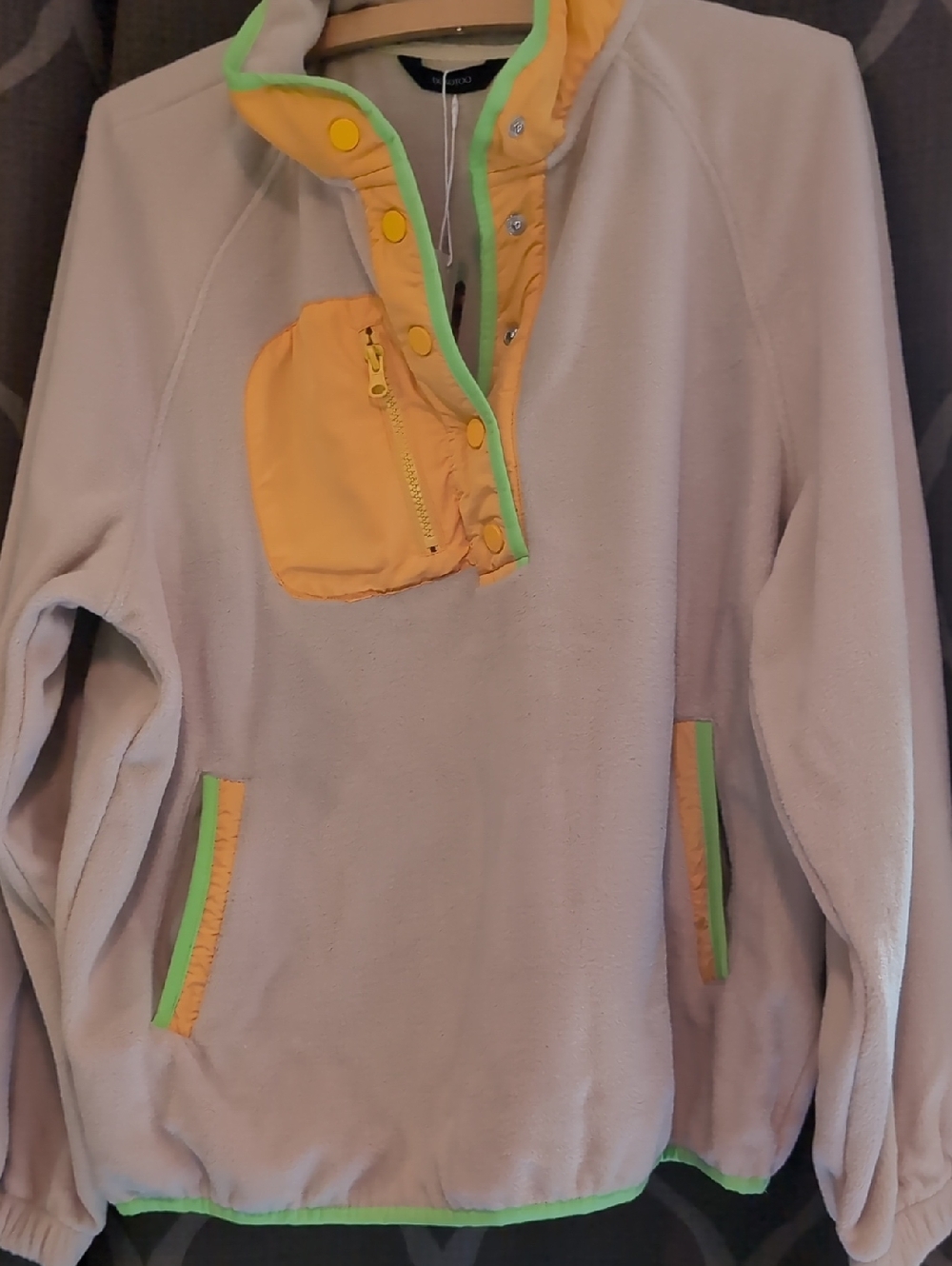 Cream Fleece Pullover with Yellow Pocket and Green Trim